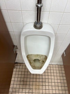 before: dirty urinal